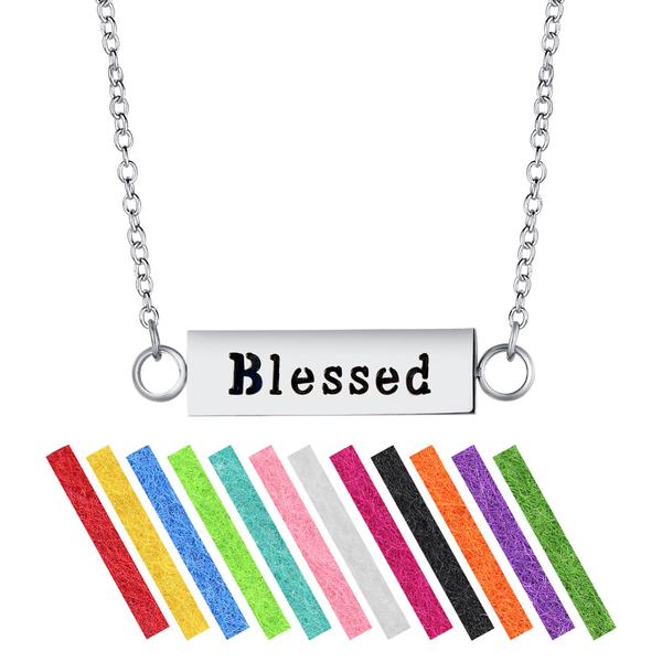 A stainless steel necklace diffuser with a 'Blessed' pendant on a chain, accompanied by vibrant colored refill pads.