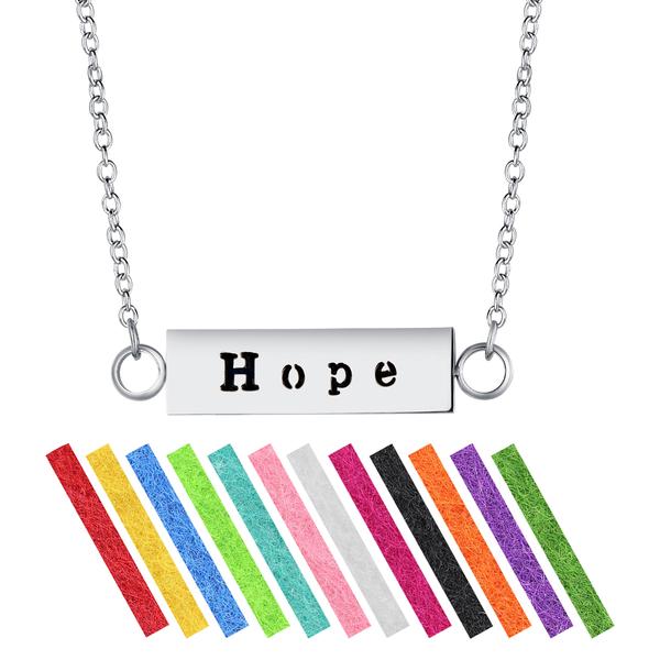 A stainless steel 'HOPE' aromatherapy necklace diffuser with an adjustable chain and colorful refill pads.